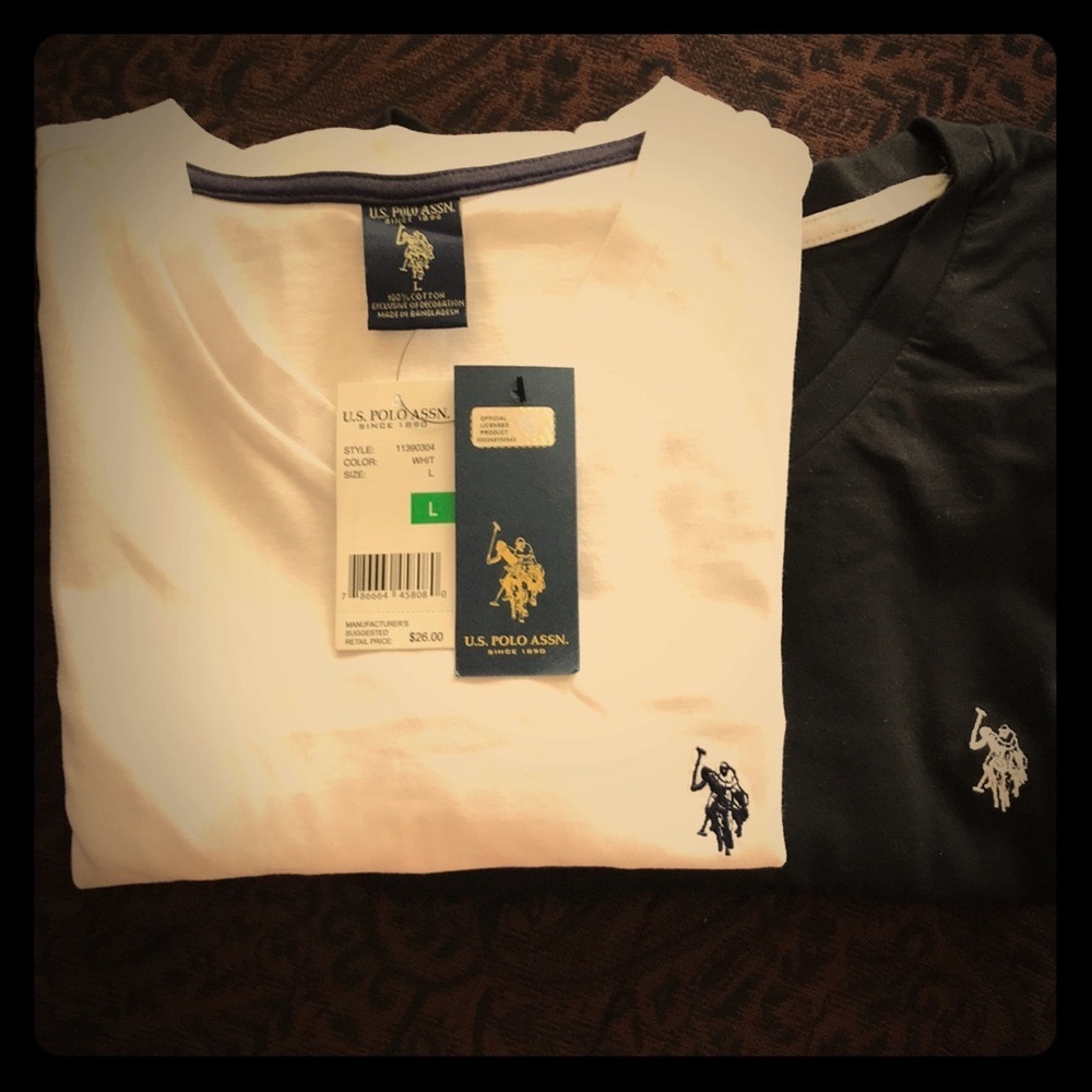 U. S. POLO ASSN. in a large. $32.00 for 2/Shirts.
